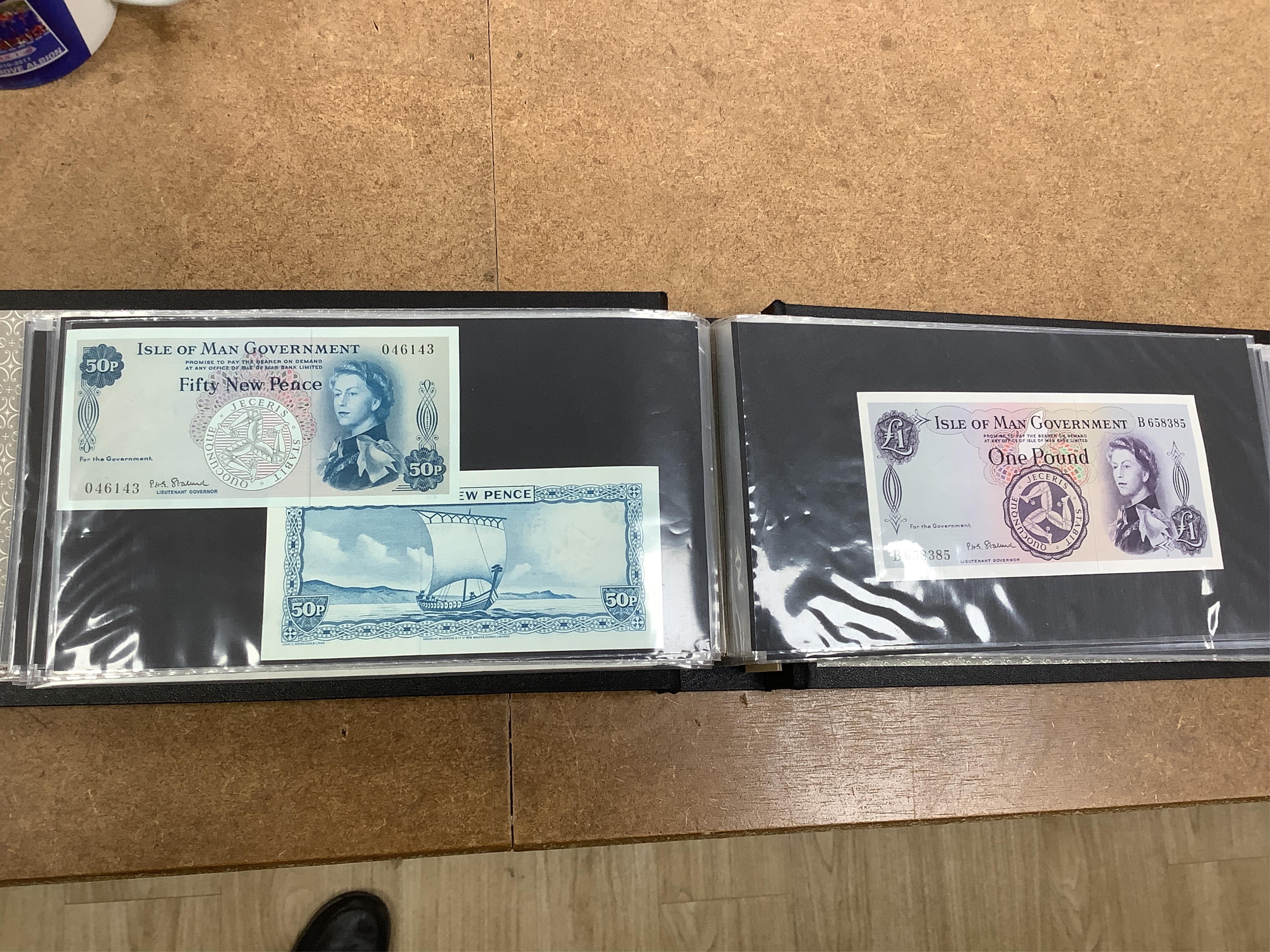 A large collection of World Banknotes, in five albums, to include Central Bank of China Republic period banknotes, UK, George V to QEII, mostly mint unused